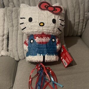 Hello Kitty Piñata with Red and Blue Ribbons